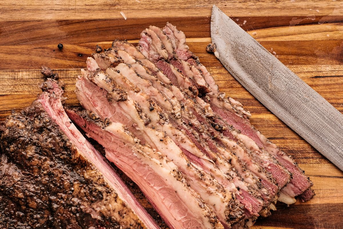 Sliced smoked brisket ready off the pit