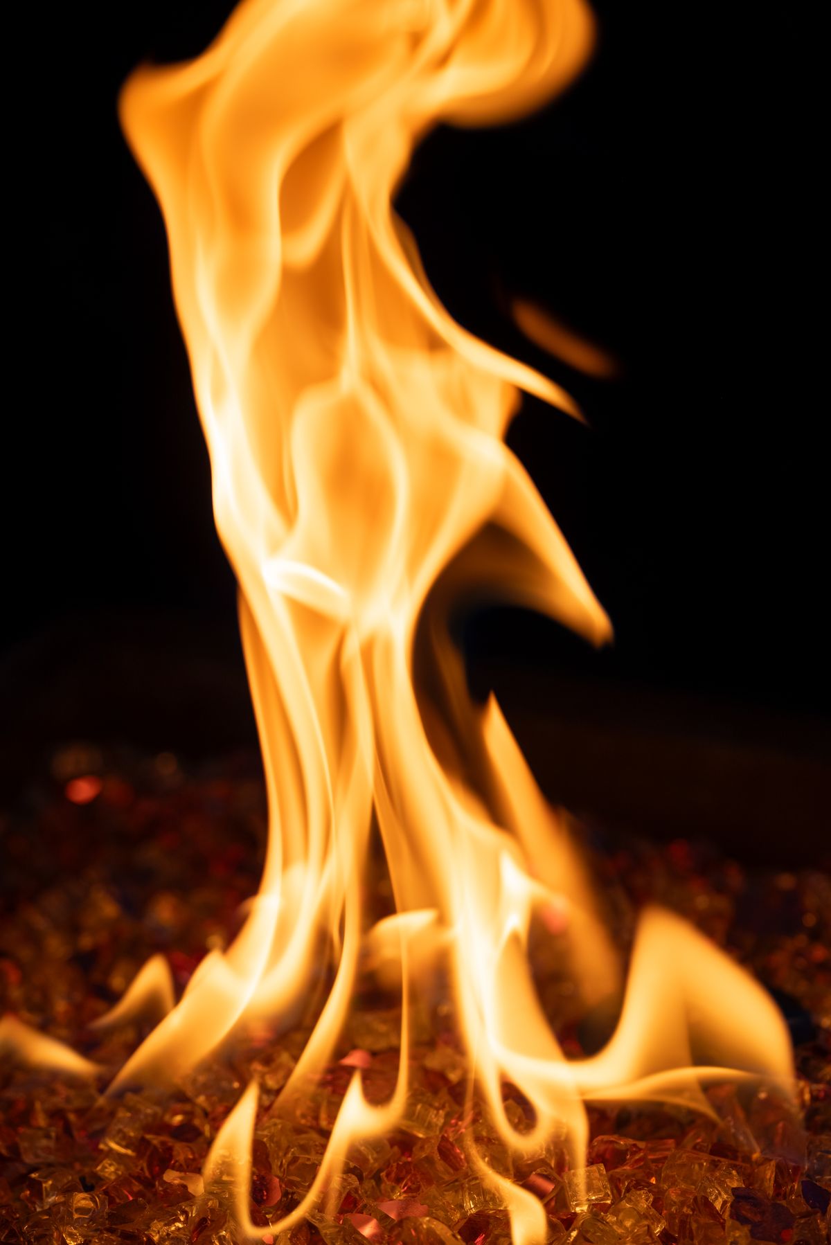 Close-up of open flame against dark background